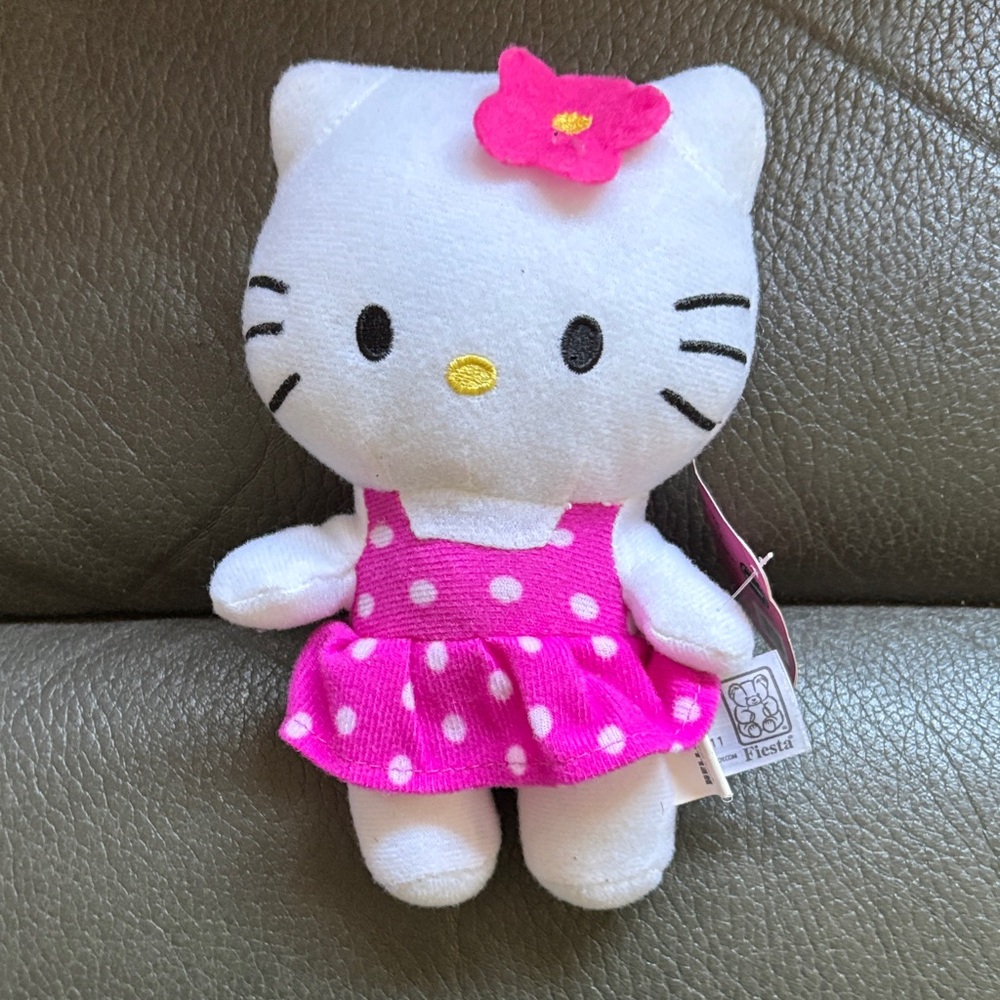 Hello kitty pink polka dot dress with matching bow stuffed animal